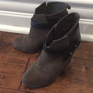 Strapped olive boot heels